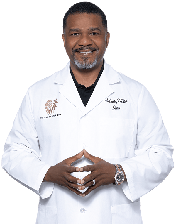Dr. Wilson in a white lab coat